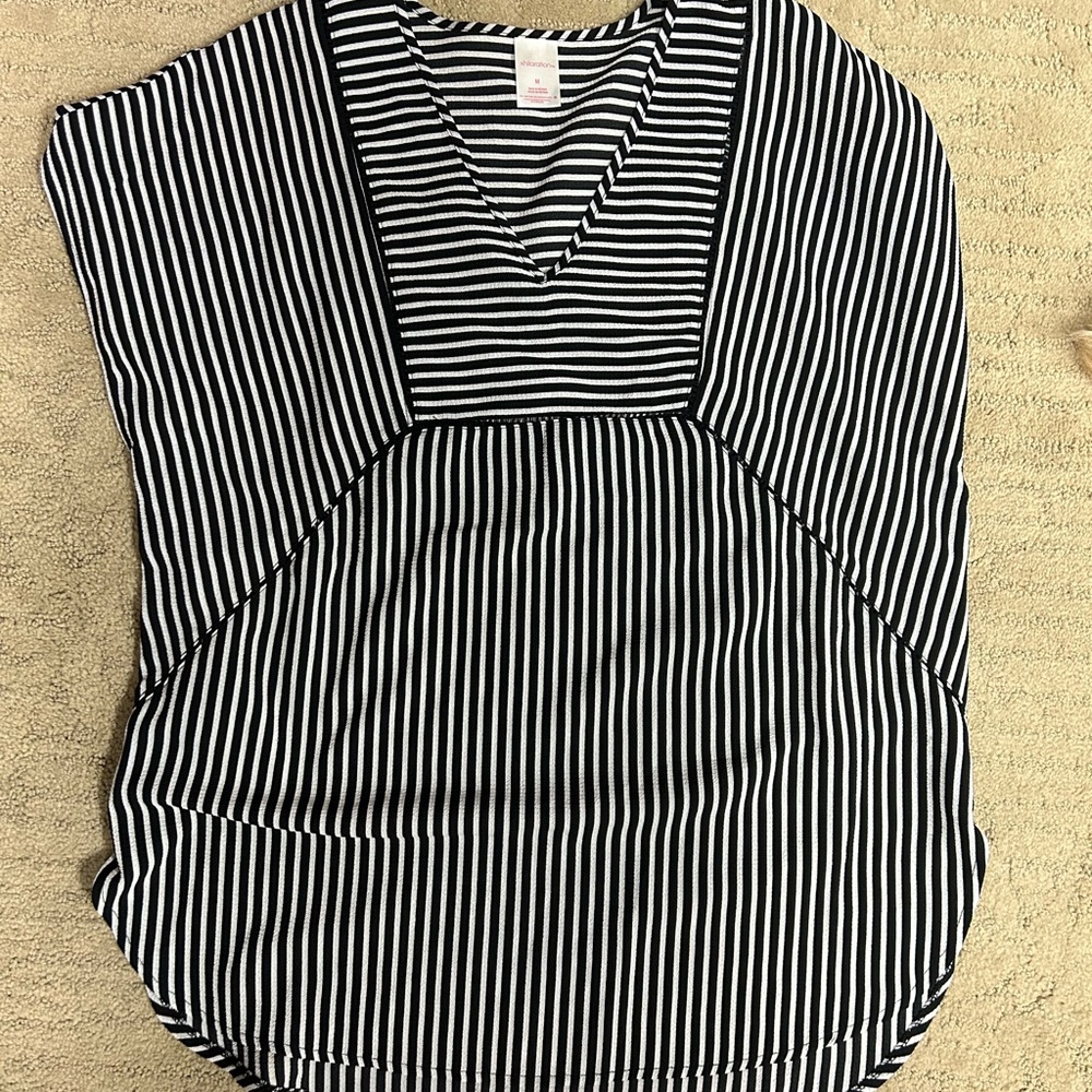 Really cute swimsuit cover up. never worn but no tags.